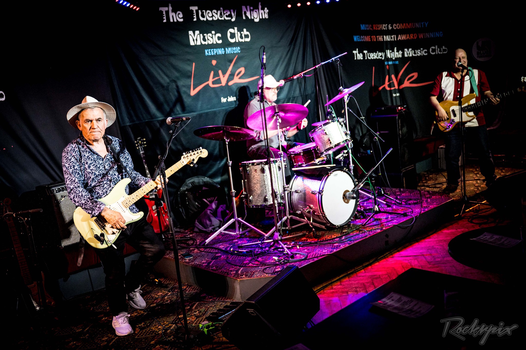 The Robin Bibi Band performing as a trio — guitar, drums and bass — at the Tuesday Night Music Club